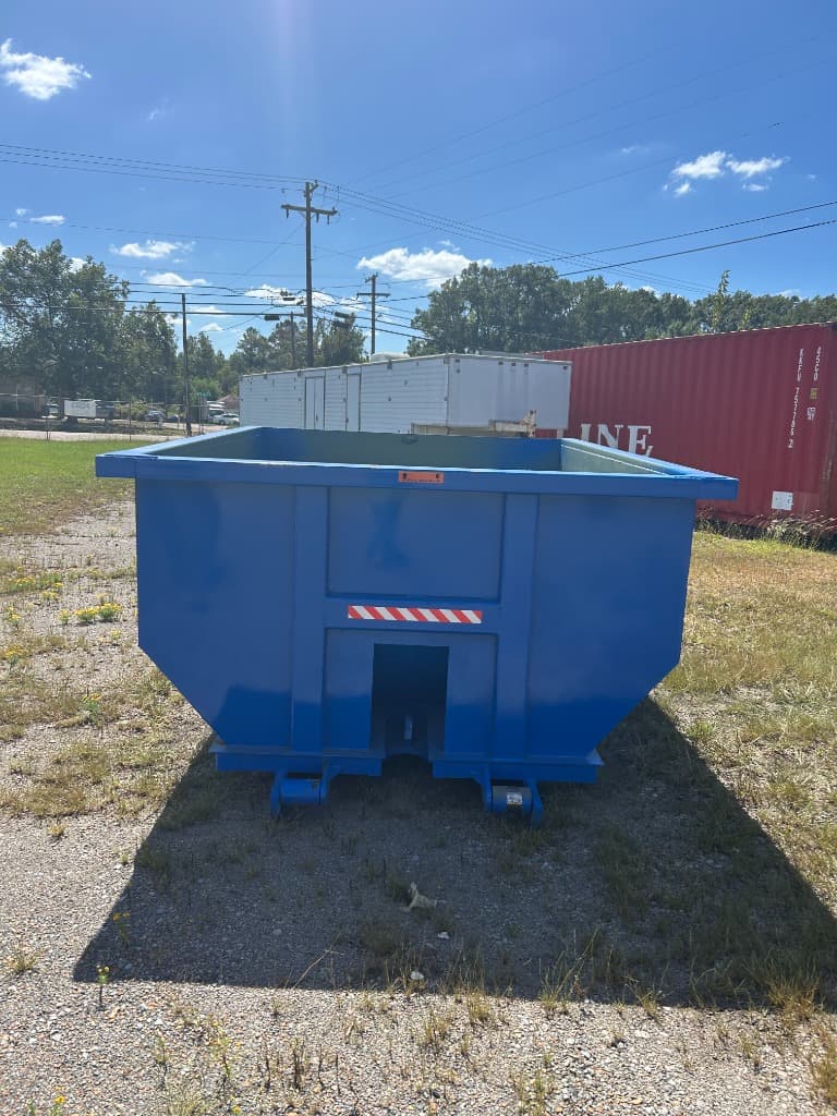 Reliable dumpster rental and waste management delivery truck operating in Richland, MS