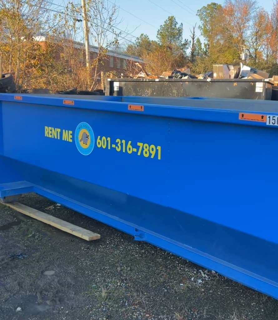 Driveway protection for dumpster in Gluckstadt